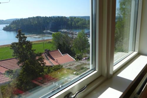 a window with a view of a view of the water at Riddarhuset in Ljungskile