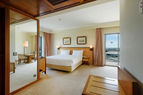Katil atau katil-katil dalam bilik di Hotel Real Oeiras