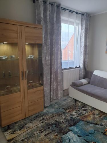 Postel nebo postele na pokoji v ubytování Apartament Szafran