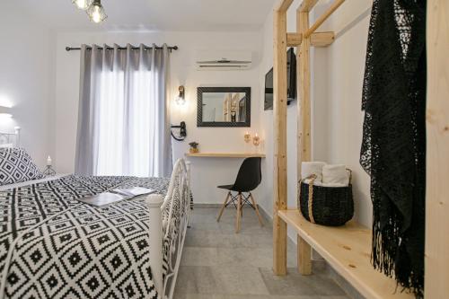 En eller flere senge i et værelse på Casa Verde Di Naxos