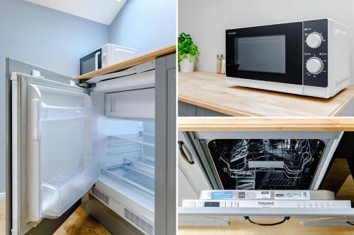 a refrigerator with its door open and a microwave at Apartament w centrum, zarezerwuj teraz in Lublin