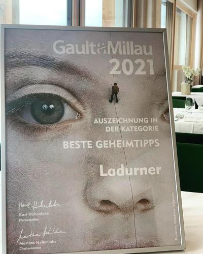 a magazine with a picture of a mans eye at Ladurner in Lagundo