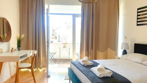 Ένα ή περισσότερα κρεβάτια σε δωμάτιο στο Seaside Murter Apartments