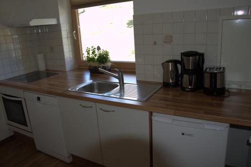 Una cocina o cocineta en Haus Alpengruß