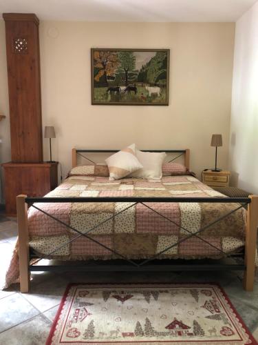 Postel nebo postele na pokoji v ubytování Agriturismo Ciambun