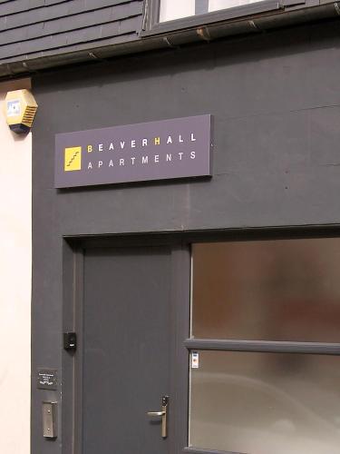 a sign on the side of a building at Beaverhall Holiday Apartments in Edinburgh