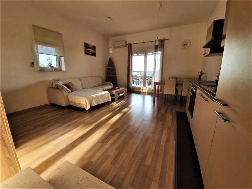 Postel nebo postele na pokoji v ubytování Apartments Kaić
