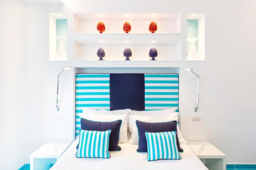 Cama o camas de una habitación en YourHome - Sersale Suites