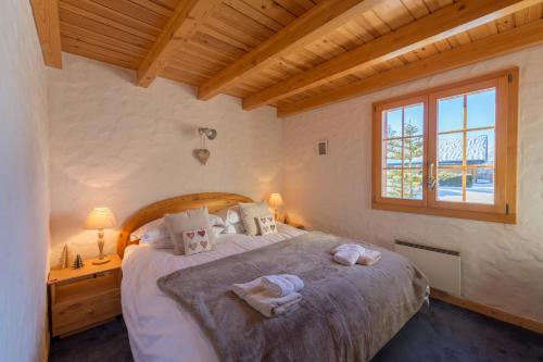 Postel nebo postele na pokoji v ubytování Chalet Pierre Blanche