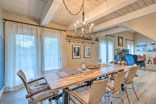 a dining room with a large wooden table and chairs at Pet-Friendly Massanutten Resort Home with Yard! in McGaheysville