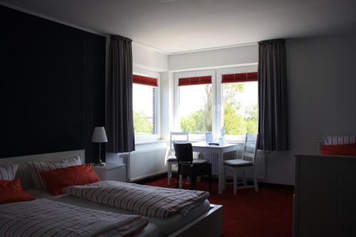 Ένα ή περισσότερα κρεβάτια σε δωμάτιο στο Gasthof Großer Krug