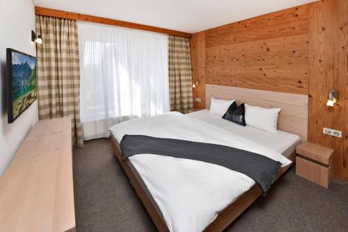 Ένα ή περισσότερα κρεβάτια σε δωμάτιο στο APLEND Hotel Kukučka