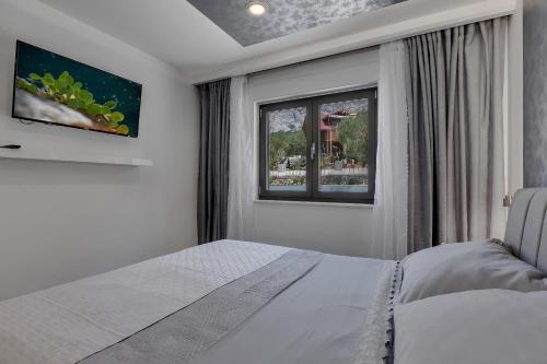 Posteľ alebo postele v izbe v ubytovaní Luxury Promajna Beach Apartment