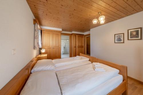 Ein Bett oder Betten in einem Zimmer der Unterkunft Quadernpark-Apartments