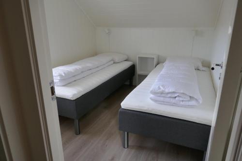Krevet ili kreveti u jedinici u objektu Seafront Holiday Home close to Reine, Lofoten