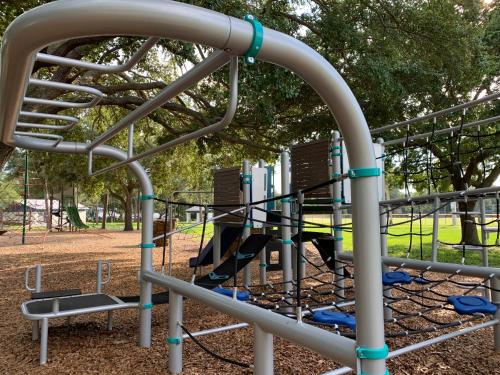 a monkey bar on a playground in a park at House 3br 1-bath, 8-min from Indian Rocks Beach, nice park thru back gate in Largo
