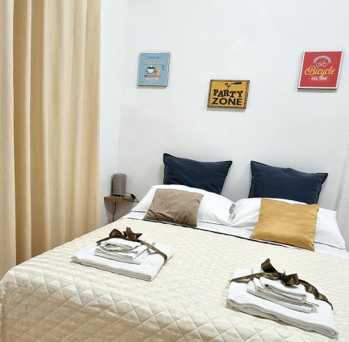 Кровать или кровати в номере Casa Napoletana - Alighieri