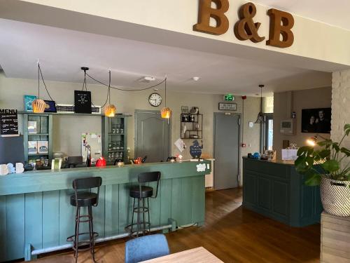 Salon ou bar de l'établissement B&B Bie Janssen