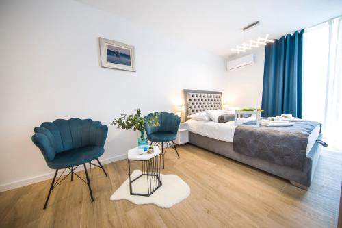 Posteľ alebo postele v izbe v ubytovaní RC Apartment