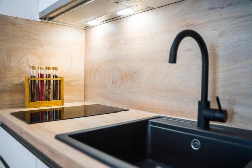 Kuchyňa alebo kuchynka v ubytovaní RC Apartment