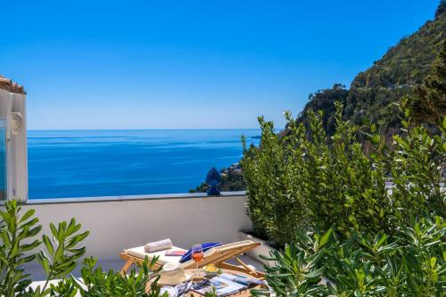 a balcony with a view of the ocean at Villa Fortuna in Positano