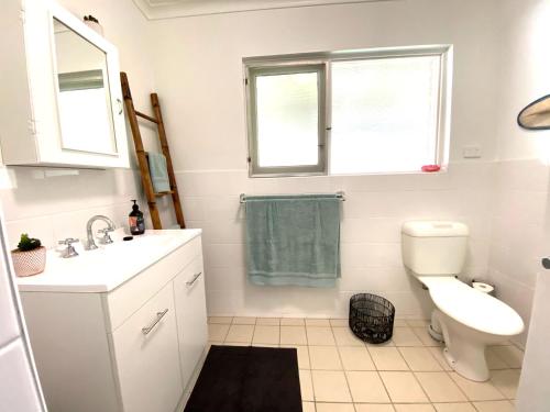 Kylpyhuone majoituspaikassa Minto Merimbula