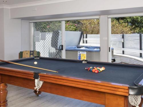 A pool table at Kendalls Beach House