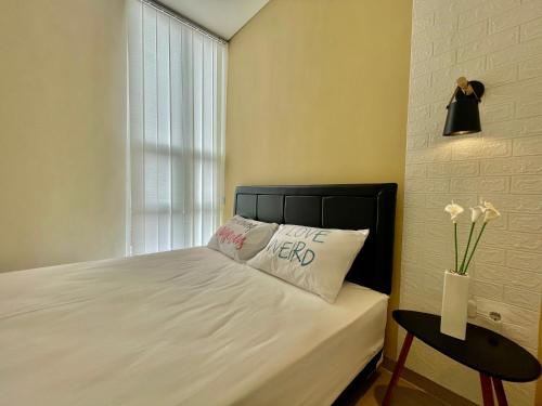 Ένα ή περισσότερα κρεβάτια σε δωμάτιο στο The Villas 36 Batu