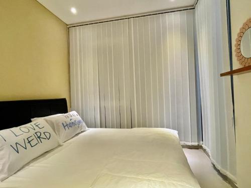 Ένα ή περισσότερα κρεβάτια σε δωμάτιο στο The Villas 36 Batu