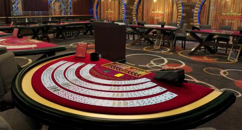 a poker table in the middle of a poker room at Mayfair Spa Resort & Casino in Gangtok