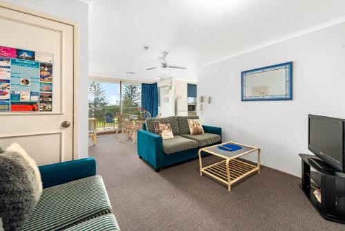 Ein Sitzbereich in der Unterkunft Sandpiper Broadbeach