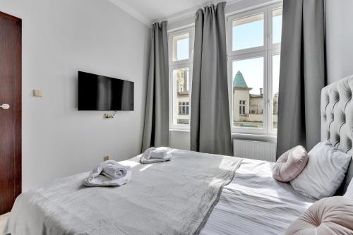 Posteľ alebo postele v izbe v ubytovaní Monte Cassino 51 by Baltica Apartments