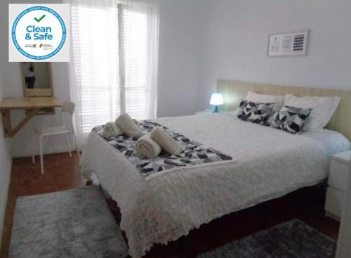 Ένα ή περισσότερα κρεβάτια σε δωμάτιο στο Lila's House