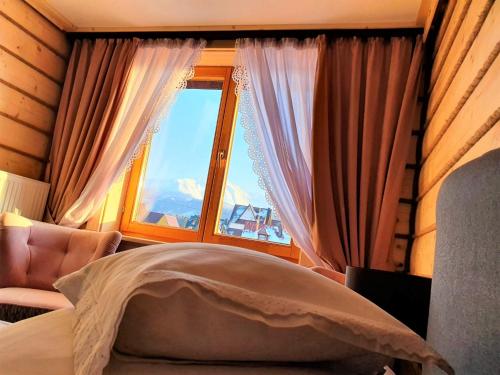ECO Willa Karpatia Ski&Wellnessにあるベッド