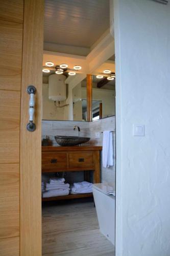 a bathroom with a sink and a mirror at Villas Ahumada. Chalet La Ahumada in Tarifa