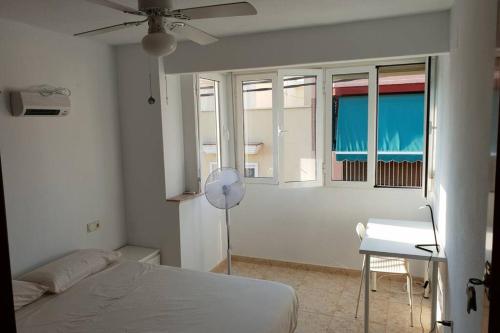A bed or beds in a room at San Carlos