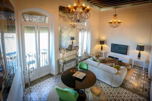 A television and/or entertainment centre at DONDE DUERME EL GUADIANA