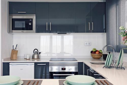Dapur atau dapur kecil di REM I Torre Pacheco