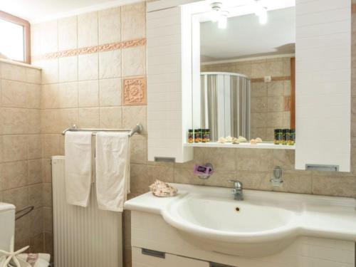 Ванная комната в Xristinas Seaside Apartments