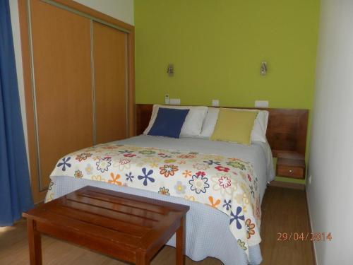 Una cama o camas en una habitación de Frentomar