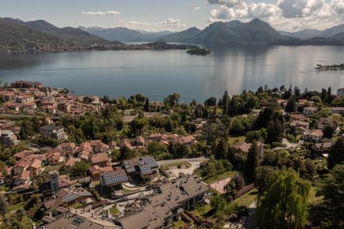an aerial view of a town next to a lake at Baveno Hills | Lakeview apartments in Baveno