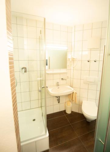 Ein Badezimmer in der Unterkunft Stadthotel Giengen