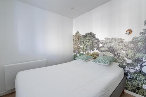 En eller flere senge i et værelse på Welcome perche ! Appartements 3 étoiles à NOGENT le Rotrou