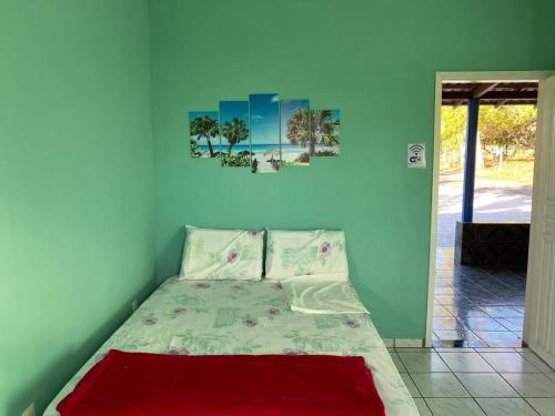 A bed or beds in a room at Pousada Raio de Sol Corumbau