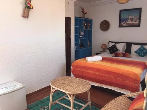 Tempat tidur dalam kamar di Kasbah Oualidia