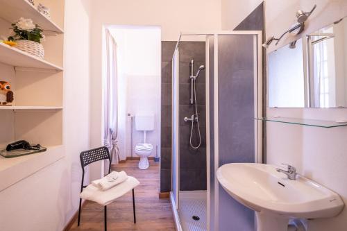 a bathroom with a sink and a shower at B&B Belvedere in Colico