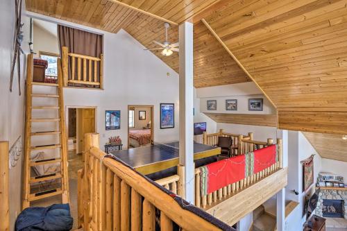 a log home with a staircase and a loft at Slopeside Sanctuary - Penthouse Less Than 1 Mi to Lifts! in Winter Park