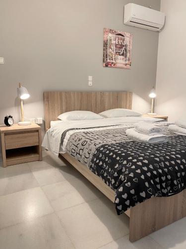Postel nebo postele na pokoji v ubytování Aggelikis House