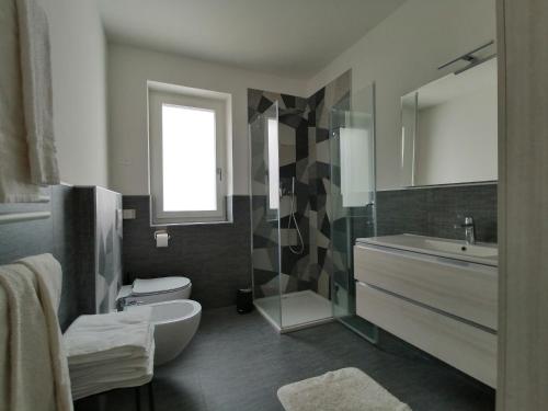 Ένα μπάνιο στο Apartments Giovannini