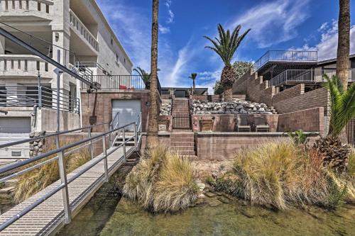 a set of stairs leading up to a building at Restful Riverfront Retreat with Private Dock and Patio in Bullhead City
